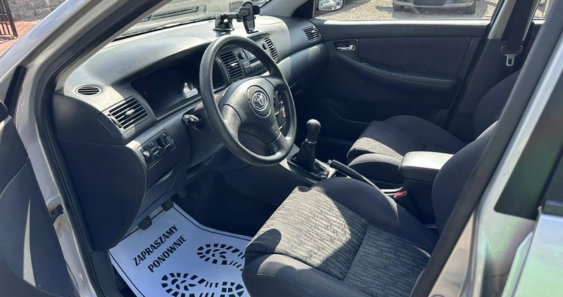 Toyota Corolla cena 8800 przebieg: 175000, rok produkcji 2003 z Głubczyce małe 137